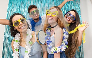 Partygoers are celebrating Carnival in Brazil. Colors: Blue, Green and Yellow.