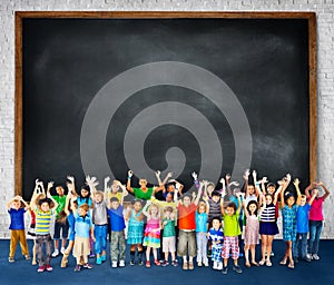 Multi-Ethnic Group of Children Holding Empty Billboard