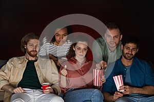 Group of Friends Watching Movie in Dark