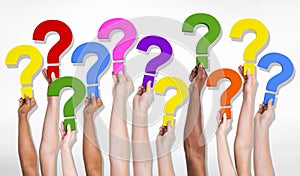 Multi-Ethnic Group of Human Hands Holding Question Marks