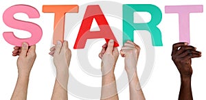 Multi ethnic group of people holding the word start