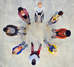 Multi-Ethnic Group of People Sitting in Circle