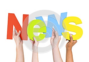 Multi-Ethnic Hands Holding The Word News