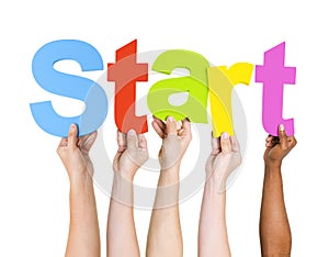 Multi-Ethnic Hands Holding The Word Start