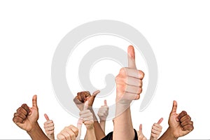 Multi-ethnic hands thump up