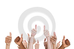 Multi-ethnic hands thump up