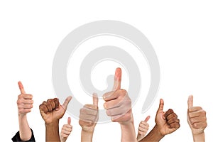 Multi-ethnic hands thump up