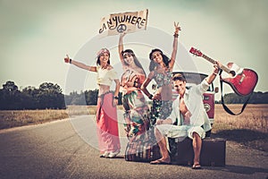 Multi-ethnic hippie travellers