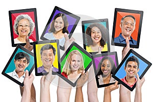 Multi-ethnic People On Digital Tablets