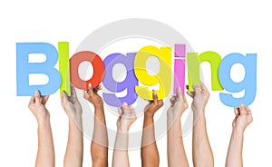 Multi Ethnic People Holding The Word Blogging