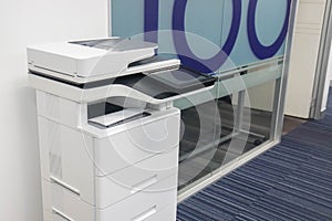 Multi functional printer in front of the office meeting room for scan and xerox business documents photo