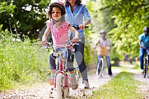 Multi Generation African American Family On Cycle Ride