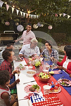 Multi generation black family at 4th July barbecue, vertical