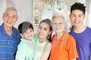 Multi-Generation Chinese Family Relaxing At Home
