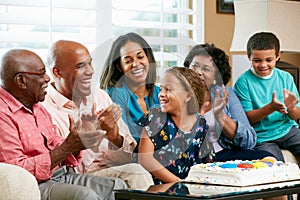 Multi Generation Family Celebrating Daughter's Birthday