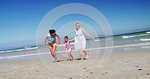 Multi generation family enjoying at beach