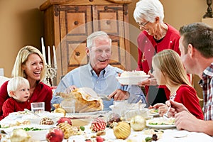 Multi Generation Family having Christmas Meal