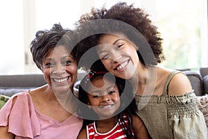 Multi-generation mixed-race family enjoying their time at home