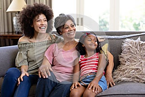 Multi-generation mixed-race family enjoying their time at home