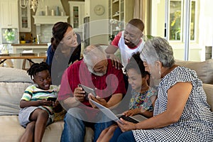 Multi-generation mixed race family at home