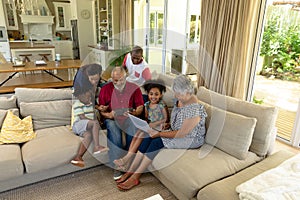 Multi-generation mixed race family at home