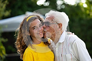 Multi-generational family, great-grandfather, great-granddaughter