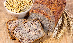 Multi-grain bread on a wooden background. Healthy food concept.