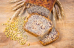 Multi-grain bread on a wooden background. Healthy food concept.