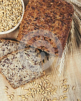 Multi-grain bread on a wooden background. Healthy food concept.