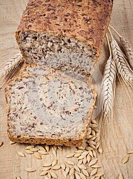 Multi-grain bread on a wooden background. Healthy food concept.