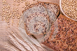 Multi-grain bread on a wooden background. Healthy food concept.