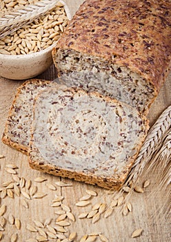 Multi-grain bread on a wooden background. Healthy food concept.