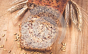 Multi-grain bread on a wooden background. Healthy food concept.