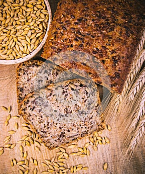 Multi-grain bread on a wooden background. Healthy food concept.