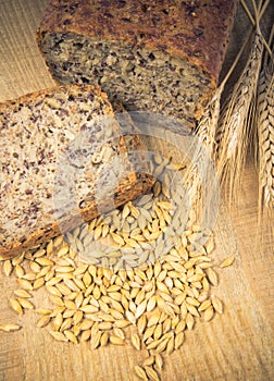 Multi-grain bread on a wooden background. Healthy food concept.