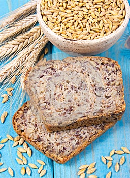 Multi-grain bread on a wooden background. Healthy food concept.