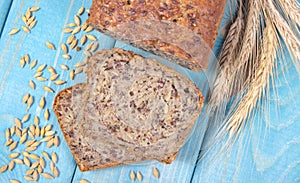 Multi-grain bread on a wooden background. Healthy food concept.