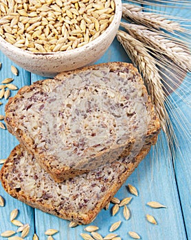 Multi-grain bread on a wooden background. Healthy food concept.