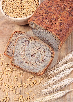 Multi-grain bread on a wooden background. Healthy food concept.