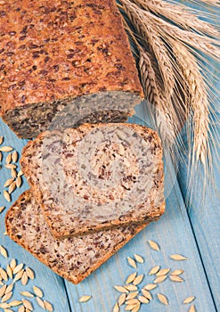 Multi-grain bread on a wooden background. Healthy food concept.