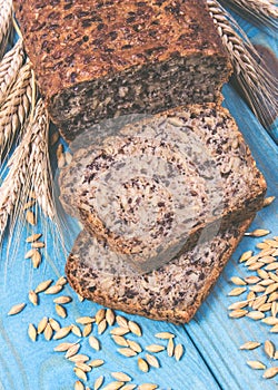 Multi-grain bread on a wooden background. Healthy food concept.