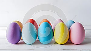 Multi hued Easter egg display against pristine white backdrop