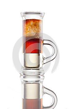 Multi-layered alcohol shot isolatet on white