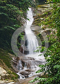 Multi-level cascading waterfall in a tropical jungle
