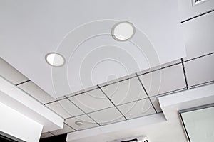Multi-level ceiling with three-dimensional protrusions.