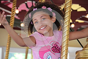 Multi Racial tween girl with pink headband