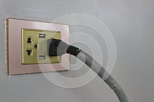 Multi-socket power strip or power surge with black plugs