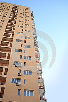multi-storey building with windows, balconies and photo