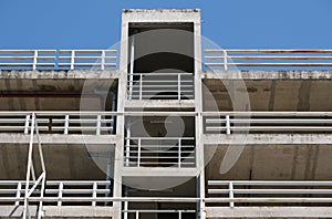 Multi-storey car park building soars into blue sky