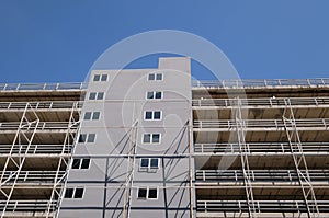 Multi-storey car park building soars into blue sky